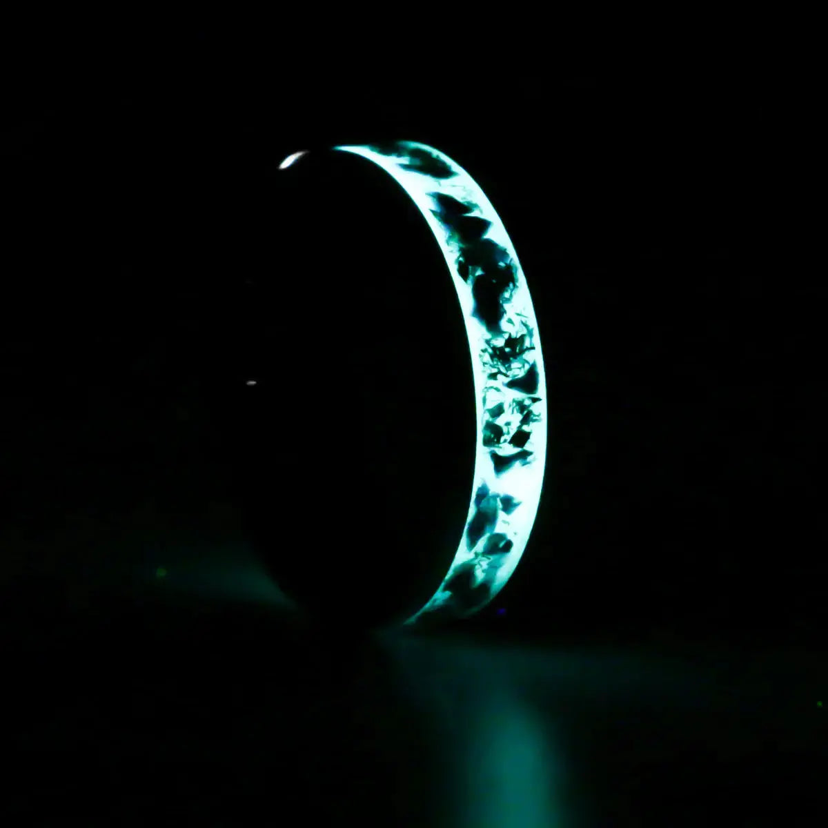 Glowing blue ring on a black background
