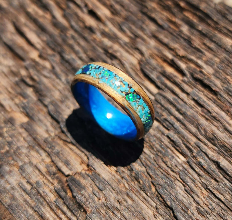 Handmade wood band with turquoise and iridescent opals and blue inside